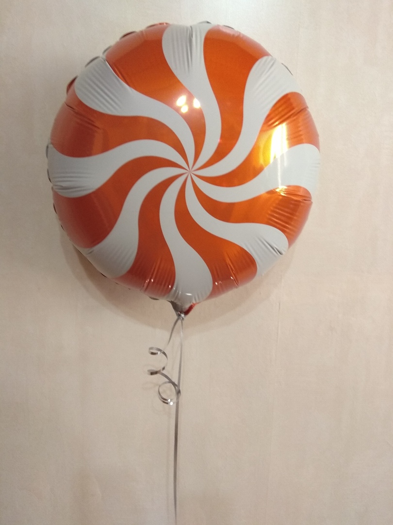 Леденец оранжевый шар фольгированный с гелием