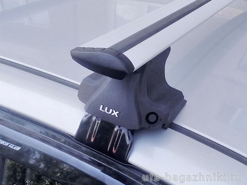 Универсальный багажник на крышу D-Lux 1, крыловидные дуги