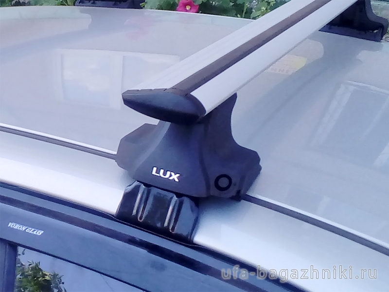 Универсальный багажник на крышу Chevrolet Lanos - D-Lux 1, крыловидные дуги