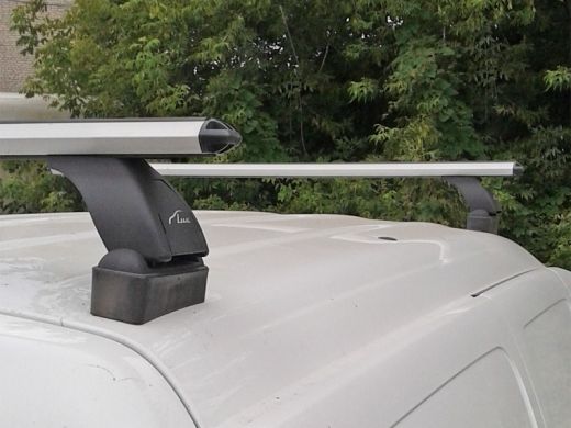 Багажник на крышу Lada Largus (без рейлингов), Lux, аэродинамические  дуги (53 мм)