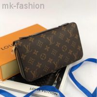 Коричневый клатч-кошелек LOUIS VUITTON MONOGRAM ZIPPY XL
