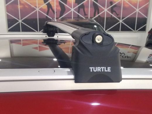 Багажник на крышу Kia Sportage 4, Turtle Air 2, аэродинамические дуги на интегрированные рейлинги (серебристый цвет)
