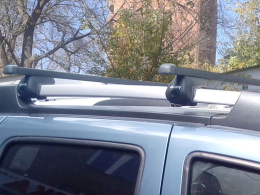 Багажник на крышу Renault Duster, Атлант, стальные прямоугольные дуги на рейлинги