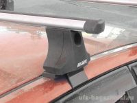 Багажник на крышу Ford Focus 1, Атлант, аэродинамические дуги "Эконом"