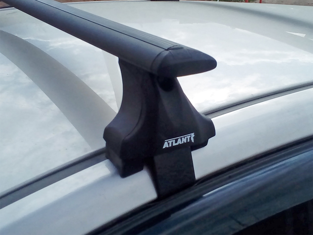 Багажник на крышу Hyundai i40 2015-..., седан, Атлант, крыловидные аэродуги (черный цвет)
