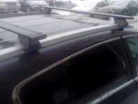 Багажник на интегрированные рейлинги Евродеталь, черные крыловидные дуги