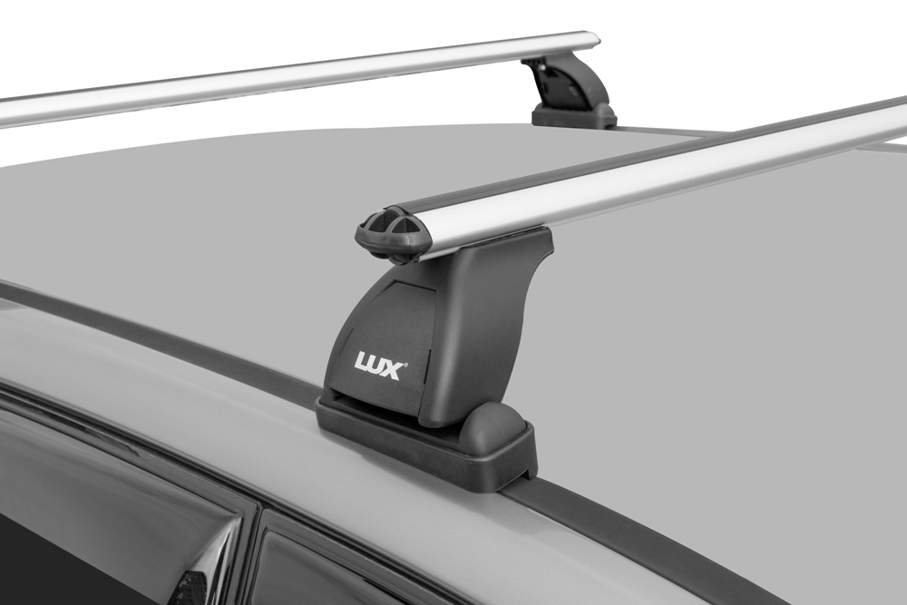 Багажник на крышу Mazda 2, Lux, аэродинамические  дуги (53 мм)