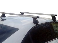 Багажник на крышу Skoda Rapid, Атлант, аэродинамические дуги Эконом, опора Е