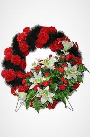 Фото Похоронный венок Круг красные гвоздики, лилии, розы.